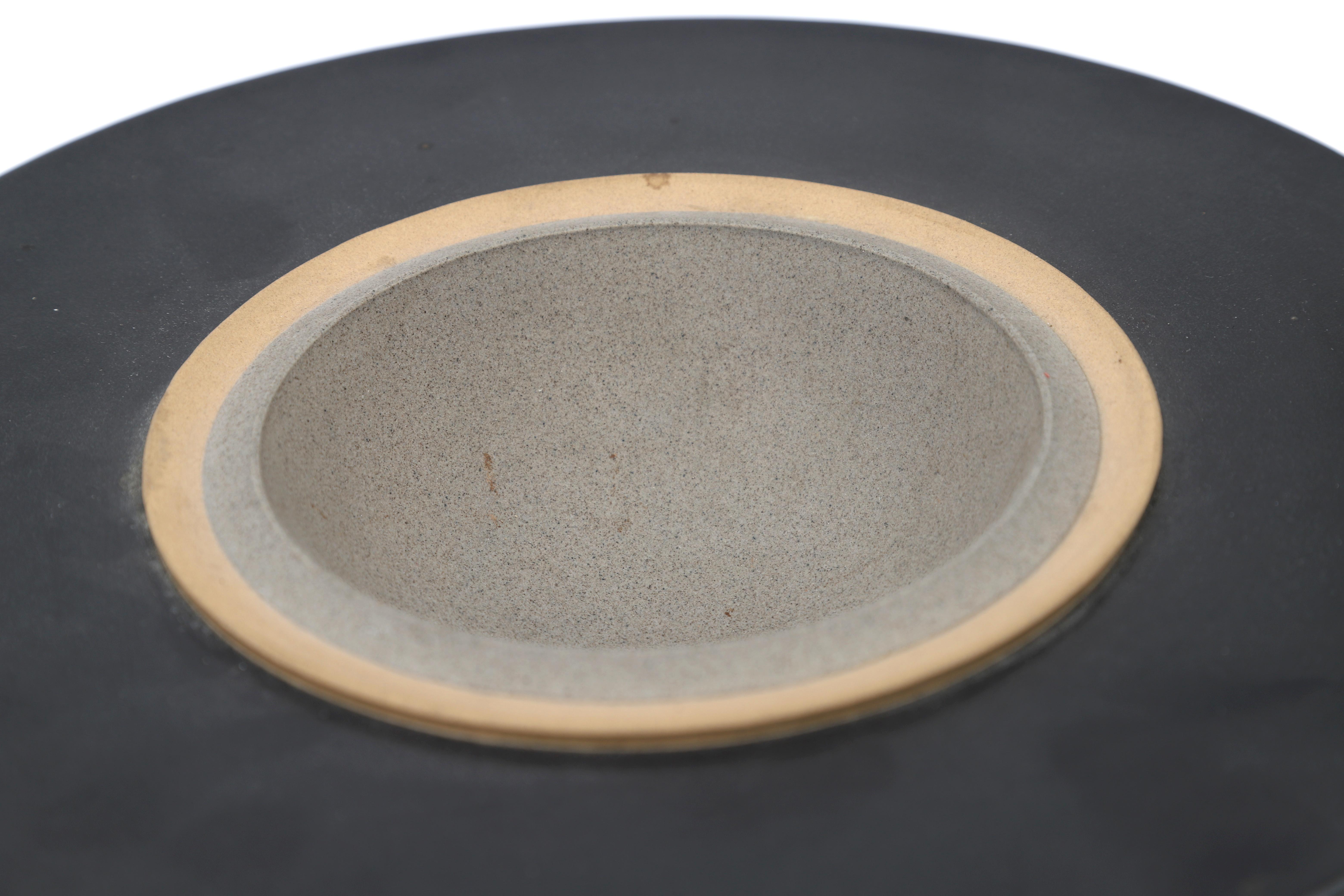 Kyra Spieker (1957) A stoneware bowl shaped as a hat, the rim glazed in black, the centre - Image 3 of 5