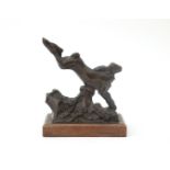 Art Deco A bronze-stained copper figure of a running hare, on wooden base, originally a book-end.