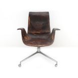 Preben Fabricius & Jørgen Kastholm A brown leather desk chair with stainless steel frame with