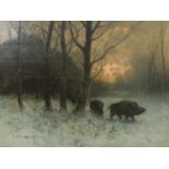 Eduard Steinbach (1878-1939) A winterlandscape with wild boars in a forest, signed l.l.. Olieverf op