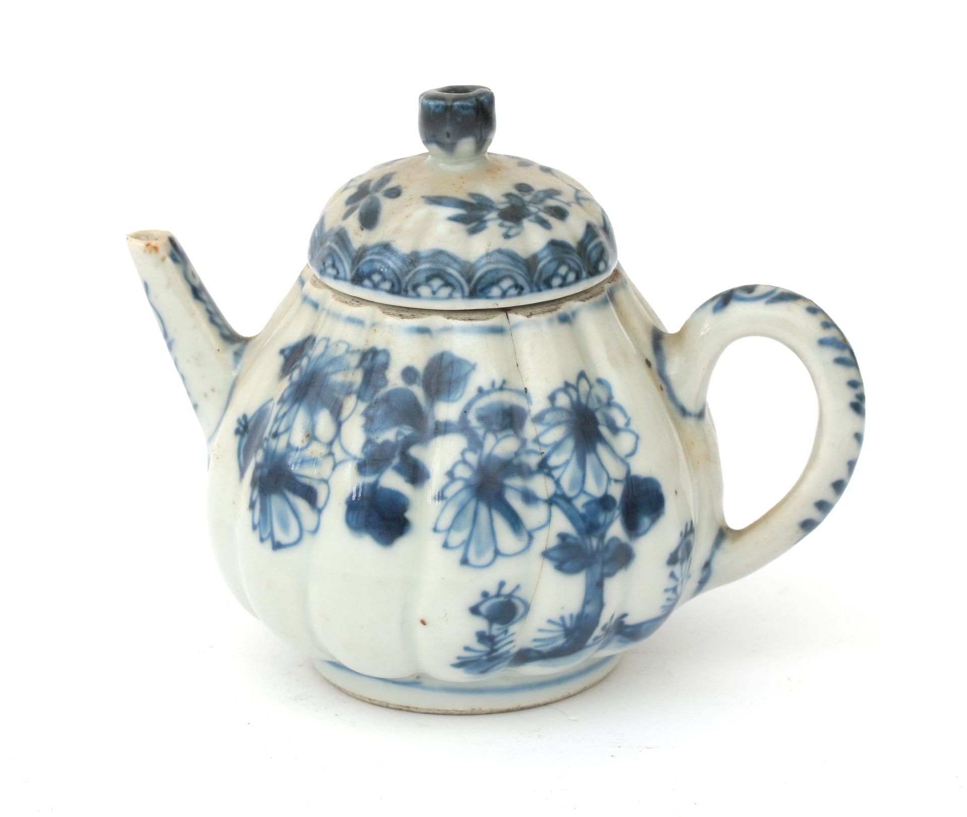 A Chinese porcelain teapot with blue-and-white flower decoration, Qianlong, second half 18th