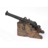 A miniature signal canon on carriage, Dutch, 19th century. Cast bronze, after earlier, 18th century