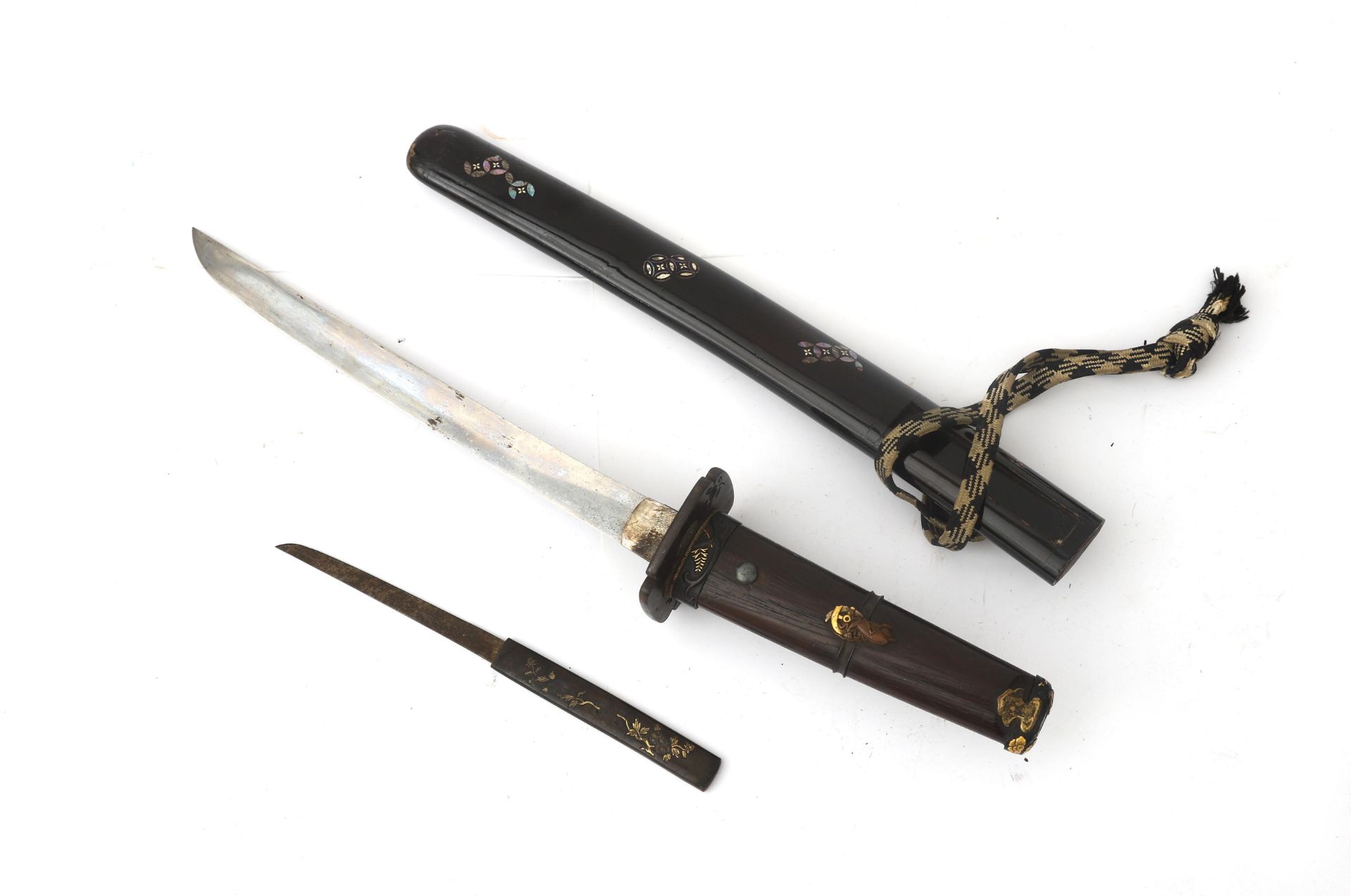 The wakizashi (脇差 / 'side inserted sword': referring to how they were worn, on one side underneath