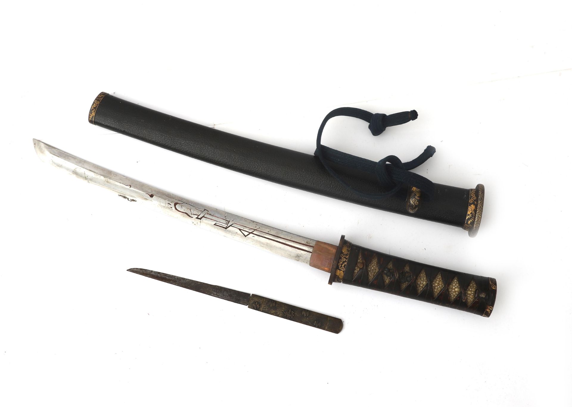 The wakizashi (脇差 / 'side inserted sword': referring to how they were worn, on one side underneath