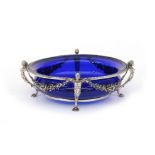 A large 835 silver dish with cobalt blue glass liner, decorated with flower festoons, and a beaded