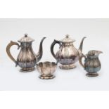 A four piece 835 silver tea, coffee service with engraved foliate decoration, comprising a teapot,