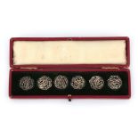 Six pierced silver modern style lily of the valley buttons in case, reg. nr. 394736, circa 1900.