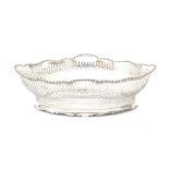 A pierced 835 silver bread basket with beaded border on base, maker's mark: van Kempen & Begeer,