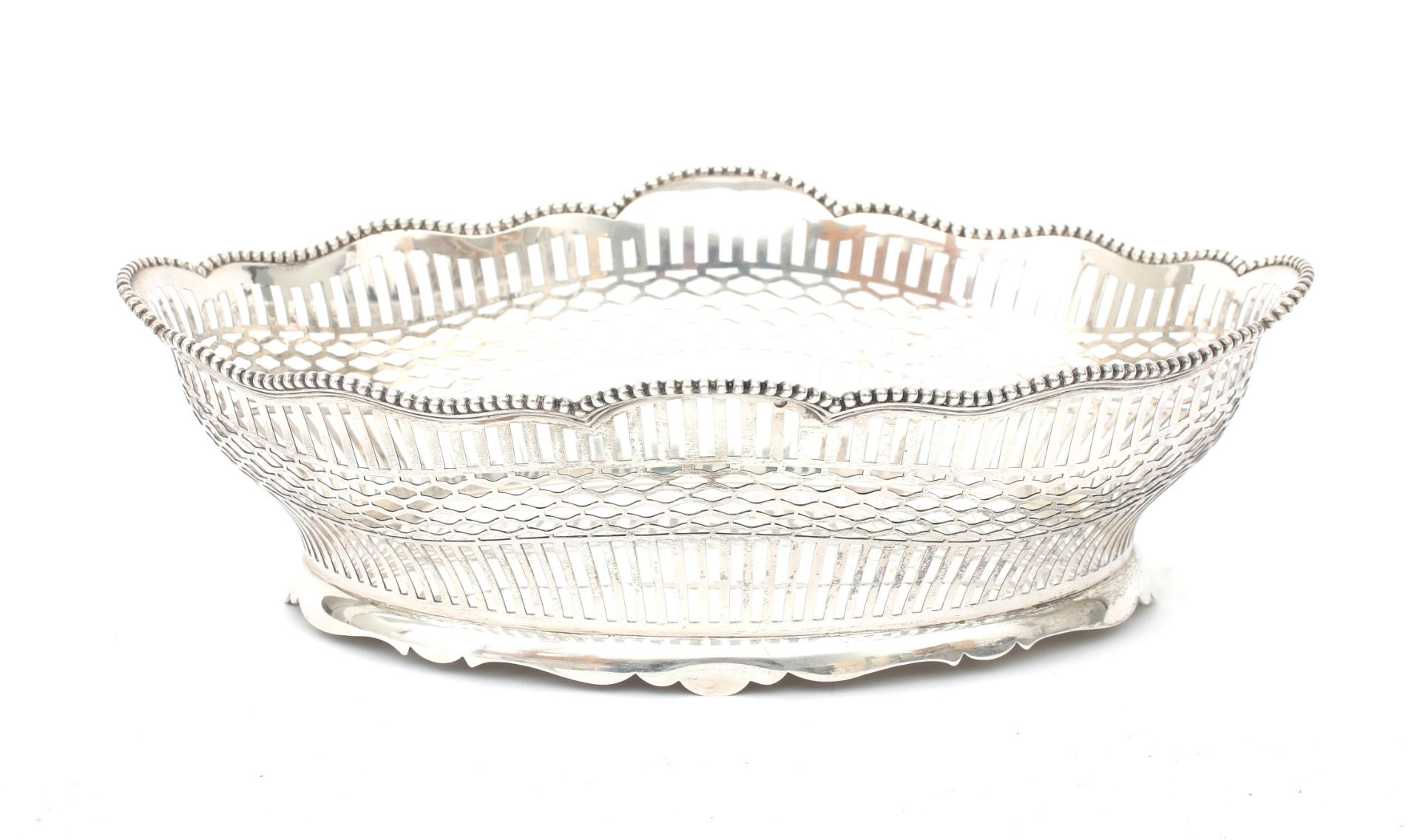 A pierced 835 silver bread basket with beaded border on base, maker's mark: van Kempen & Begeer,