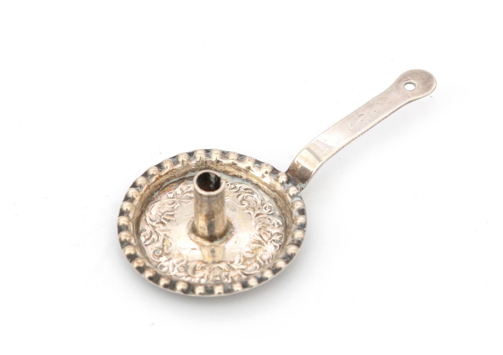 A 835 silver miniature chamberstick, Amsterdam, 18th century. L. 7,7 cm.