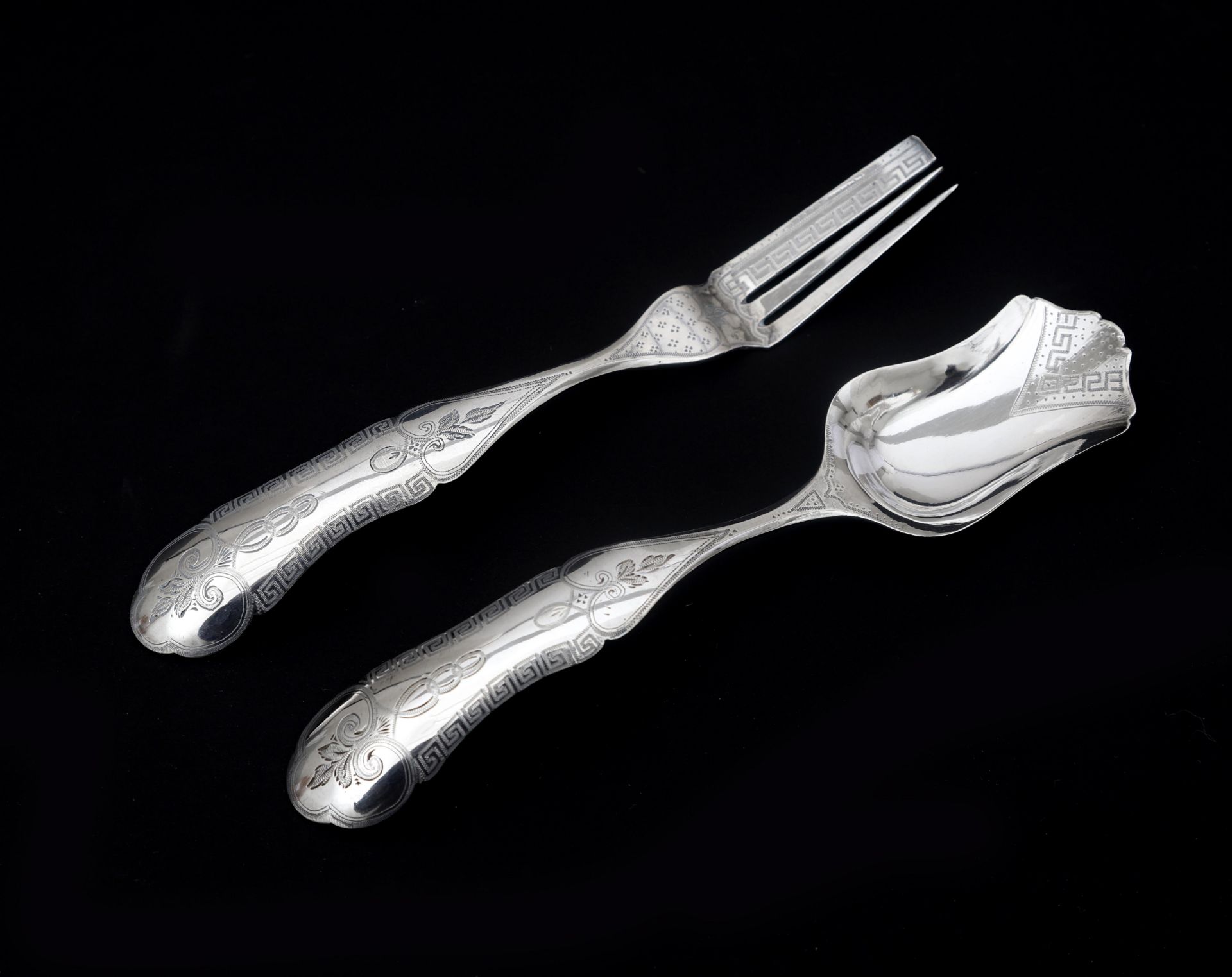 A Dutch silver ginger place setting from 1874. Biedermeier model. maker: unclear. Weight: 58.3 g.