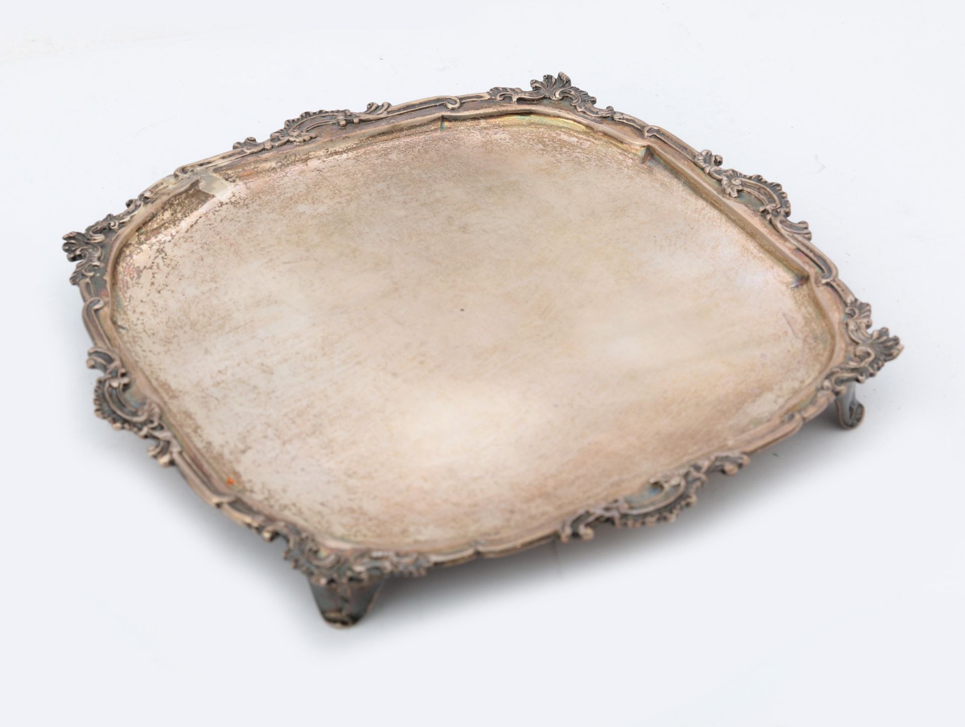 A square 835 silver cabaret with rocaille border and four finials, maker's mark: Gerrit Willem