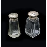 Two sugar casters, crystal with a silver sprinkle cap. Including one marked: Germany835S. BC. And