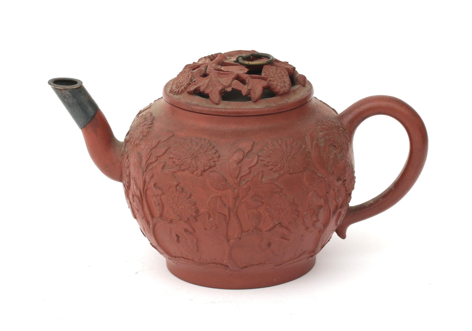 A silver mounted yixing tea pot with relief chrysantemus decoration and a pierced lid, Kangxi,