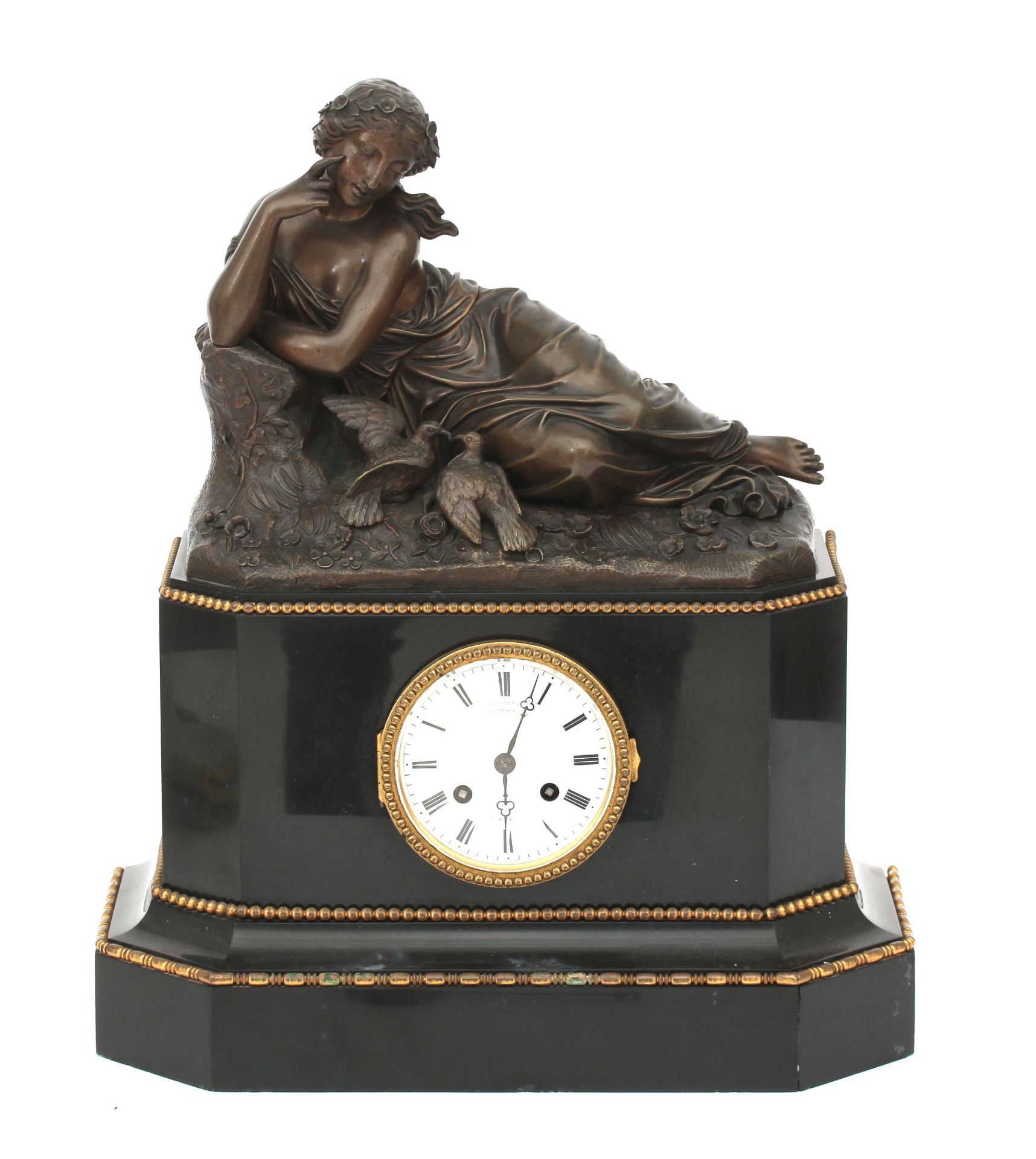 The case crowned with allegory of love, resting on a black marble base, the dial face with Roman