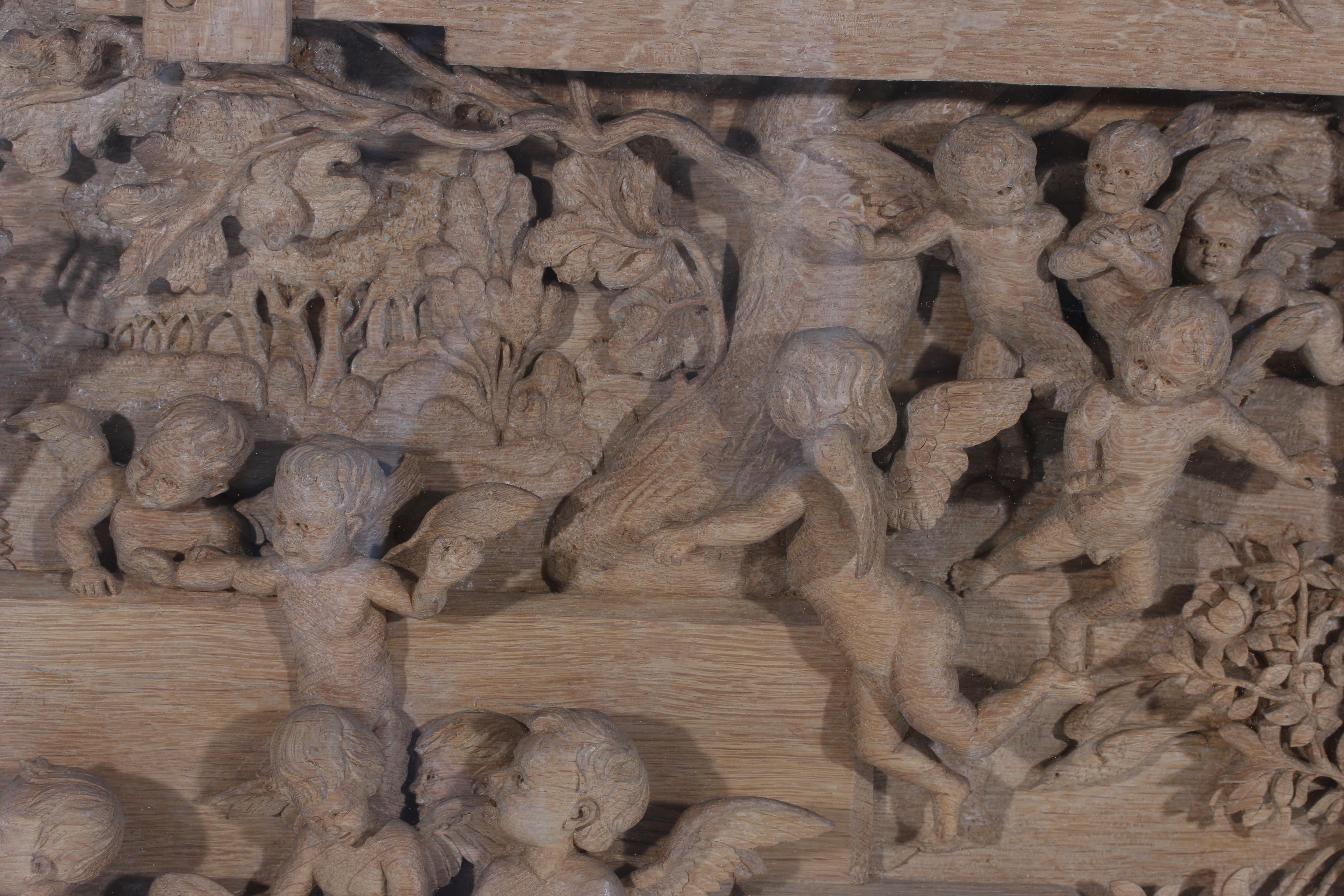 A carved wooden relief with scene of a spinster with children and putti, Germany, late 19th - Image 3 of 4