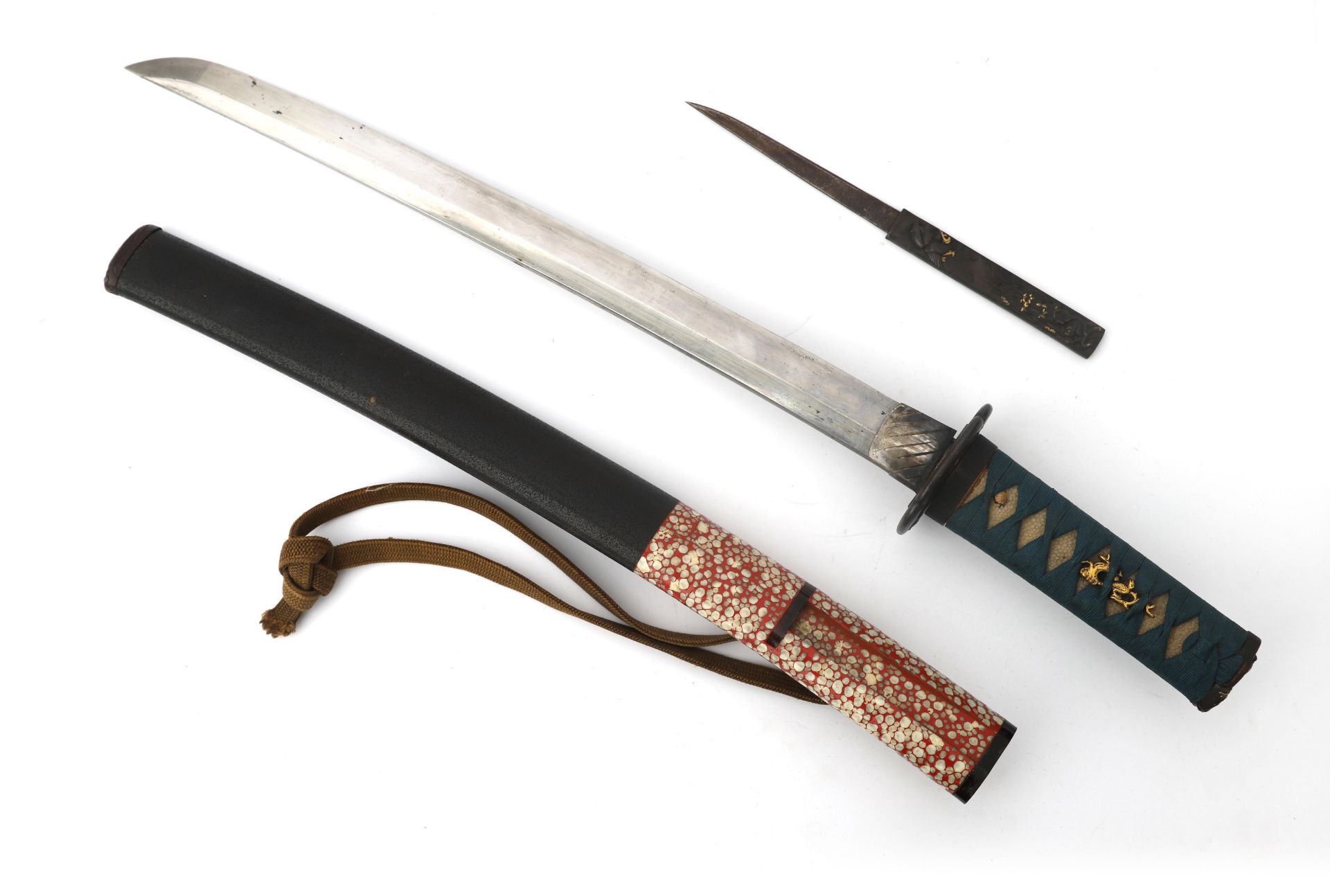 The wakizashi (脇差 / 'side inserted sword': referring to how they were worn, on one side underneath