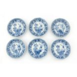 Six Chinese porcelain dishes, decorated with foliate motifs and blosom branches, Kangxi period,