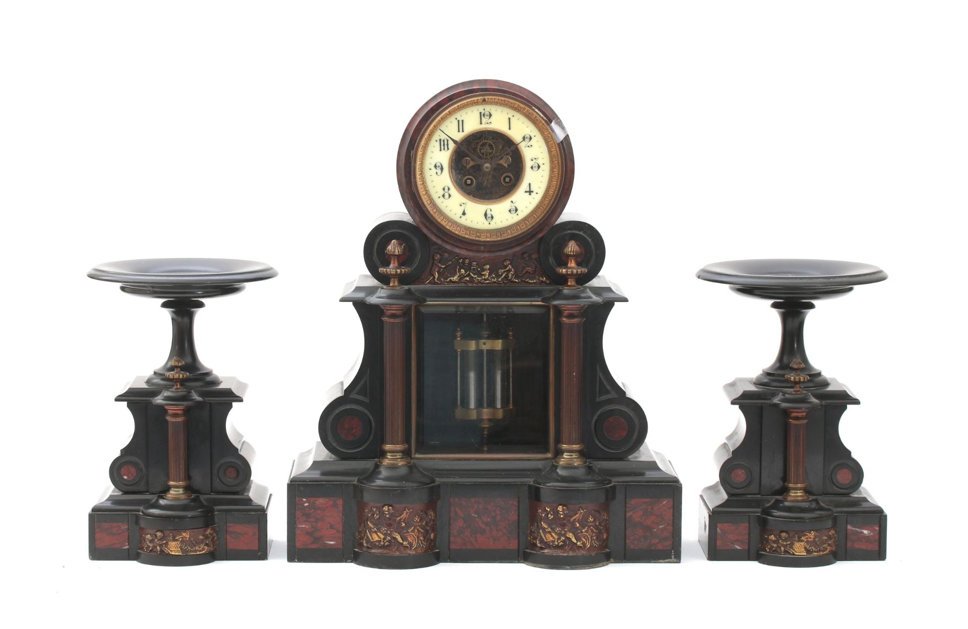 A black and red marble table clock and two coupes decorated with putti, white dial with Arabic