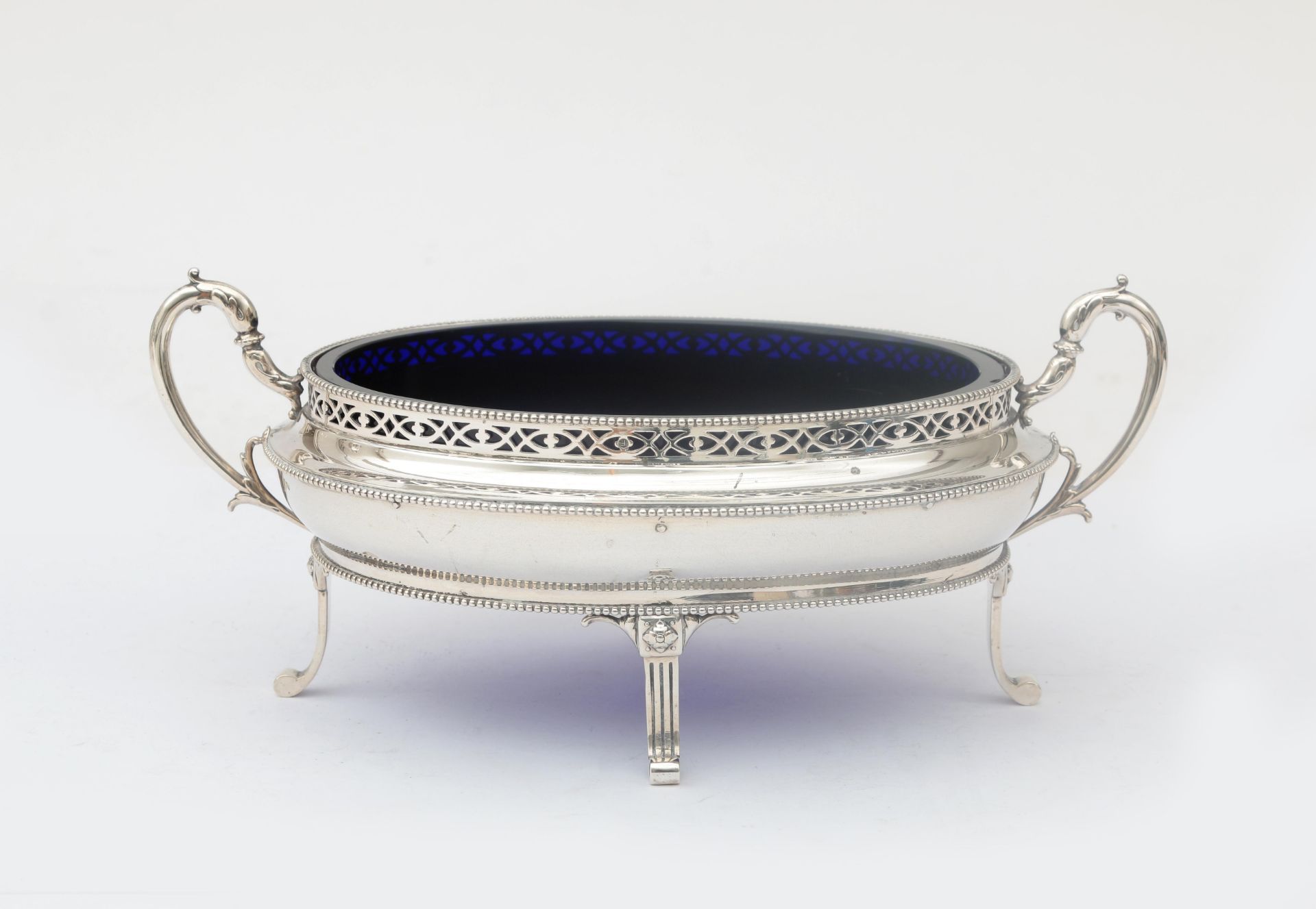 A Dutch second grade silver jardinière in Louis Seize style, with pearl rims, openwork gallery rim