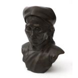 Indonesische School, 20e eeuw. A bronze statue of a bust of a Javenese man with traditional