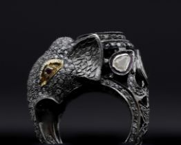 A 835 silver cocktail ring, completely designed in the shape of an elephant, completely pavé set all