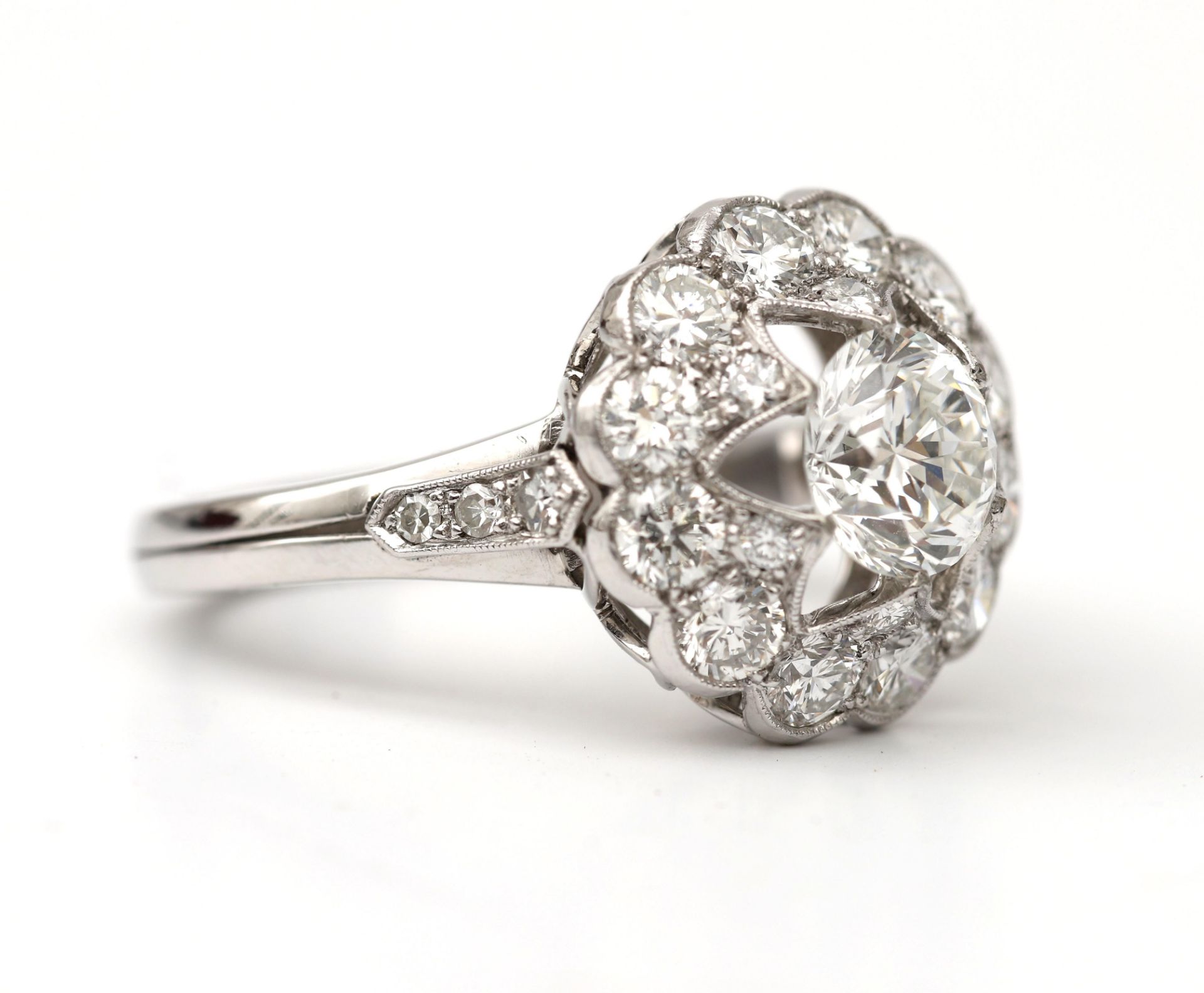 A 14 karat white gold with platinum rosette ring, set with diamonds, in total approx. 2.21ct. - Image 6 of 10