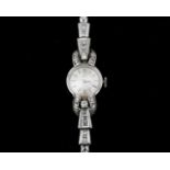 An 18 karat white gold Ebel women's wristwatch with diamonds