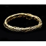 A 14 karat gold braided bracelet