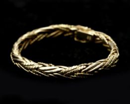 A 14 karat gold braided bracelet 