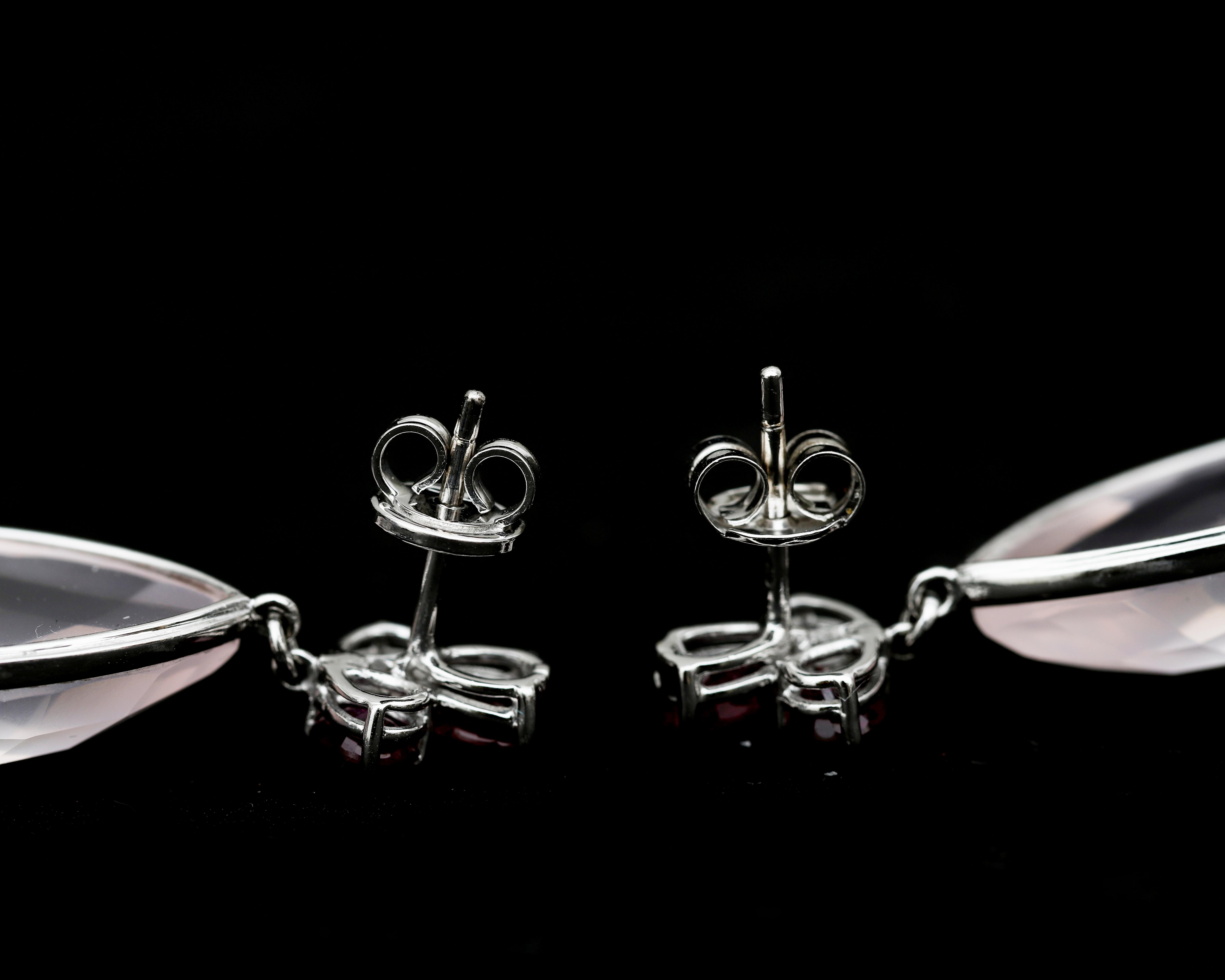 A pair of 14 karat white gold earrings set with rose quartz and six rubies - Image 3 of 3