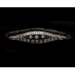 A 14 karat white gold Art Deco bracelet, set with Diamonds