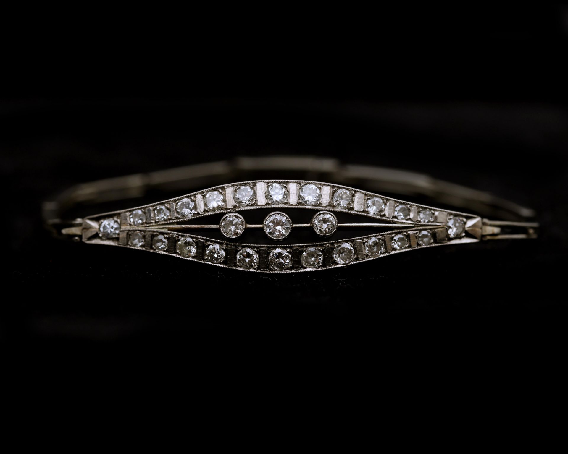 A 14 karat white gold Art Deco bracelet, set with Diamonds