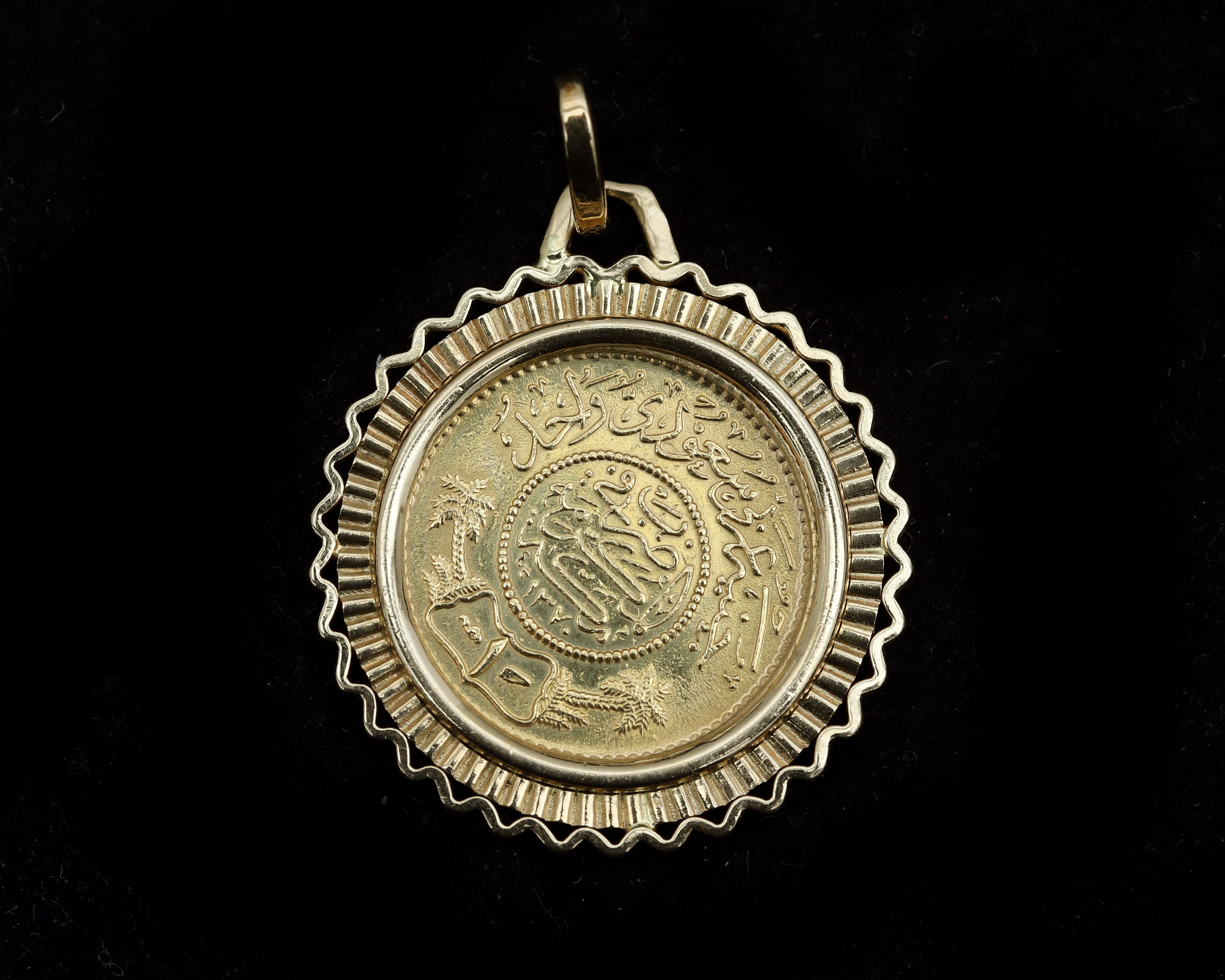 An 18 karat gold floral decorated coin edge, set with a possible Arabic coin