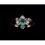 A 14 karat gold ring, with green Tourmaline and Diamonds