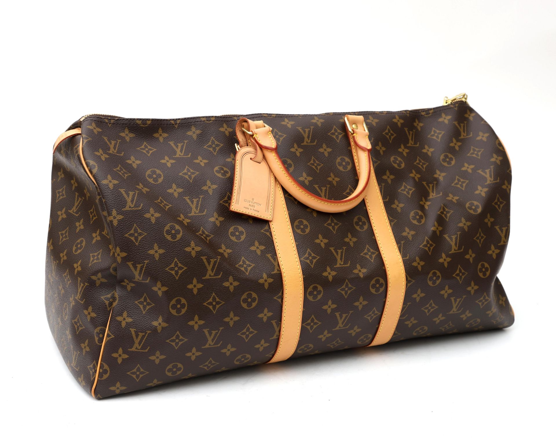 An original vintage Louis Vuitton travel bag, model Keepall 55