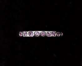 An 18 karat gold ring by Al Coro with pink sapphire
