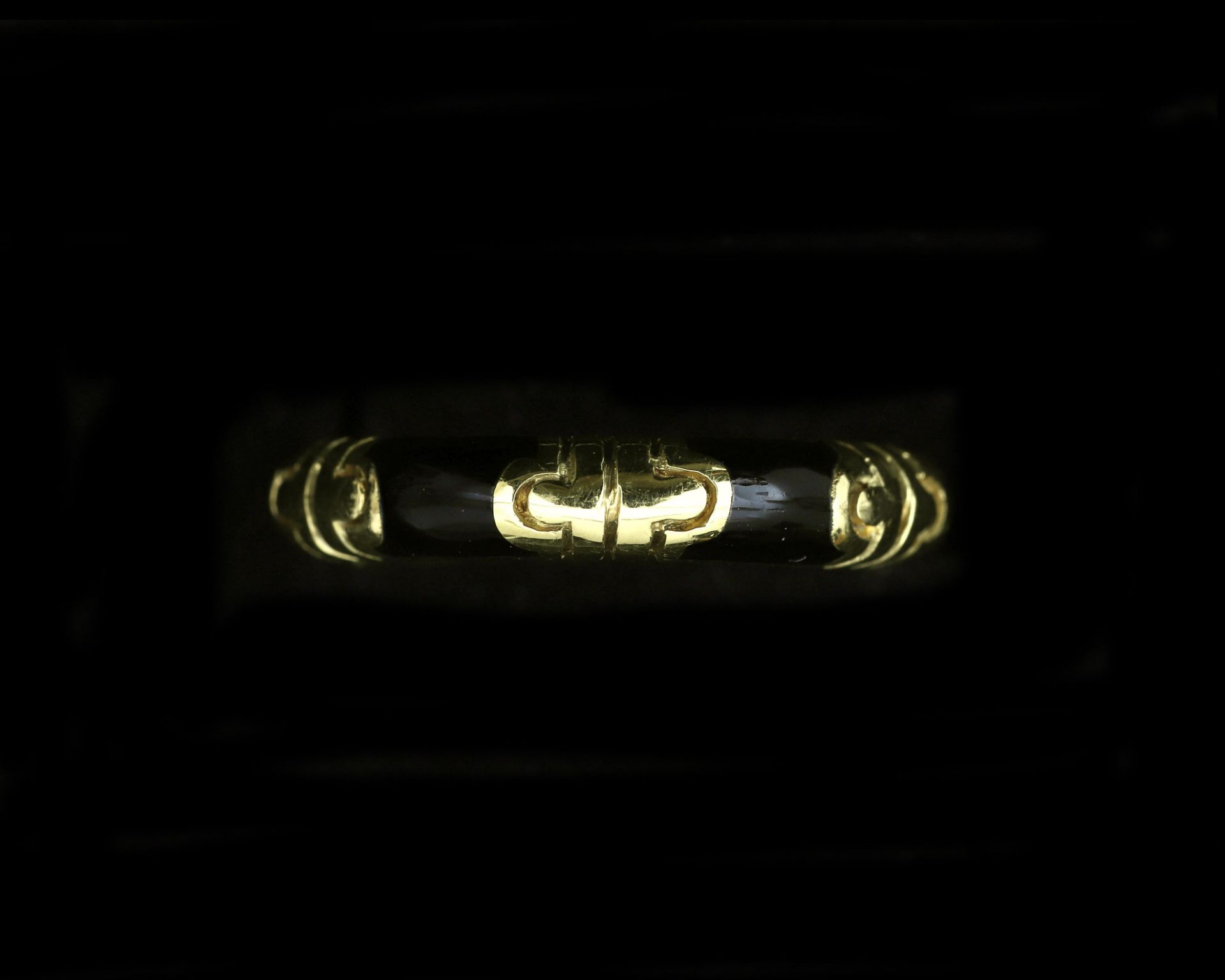 A 14 karat gold Hidalgo ring with black enamel 