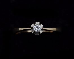A 14 karat gold solitaire ring set with brilliant cut diamond 0.15 ct. 