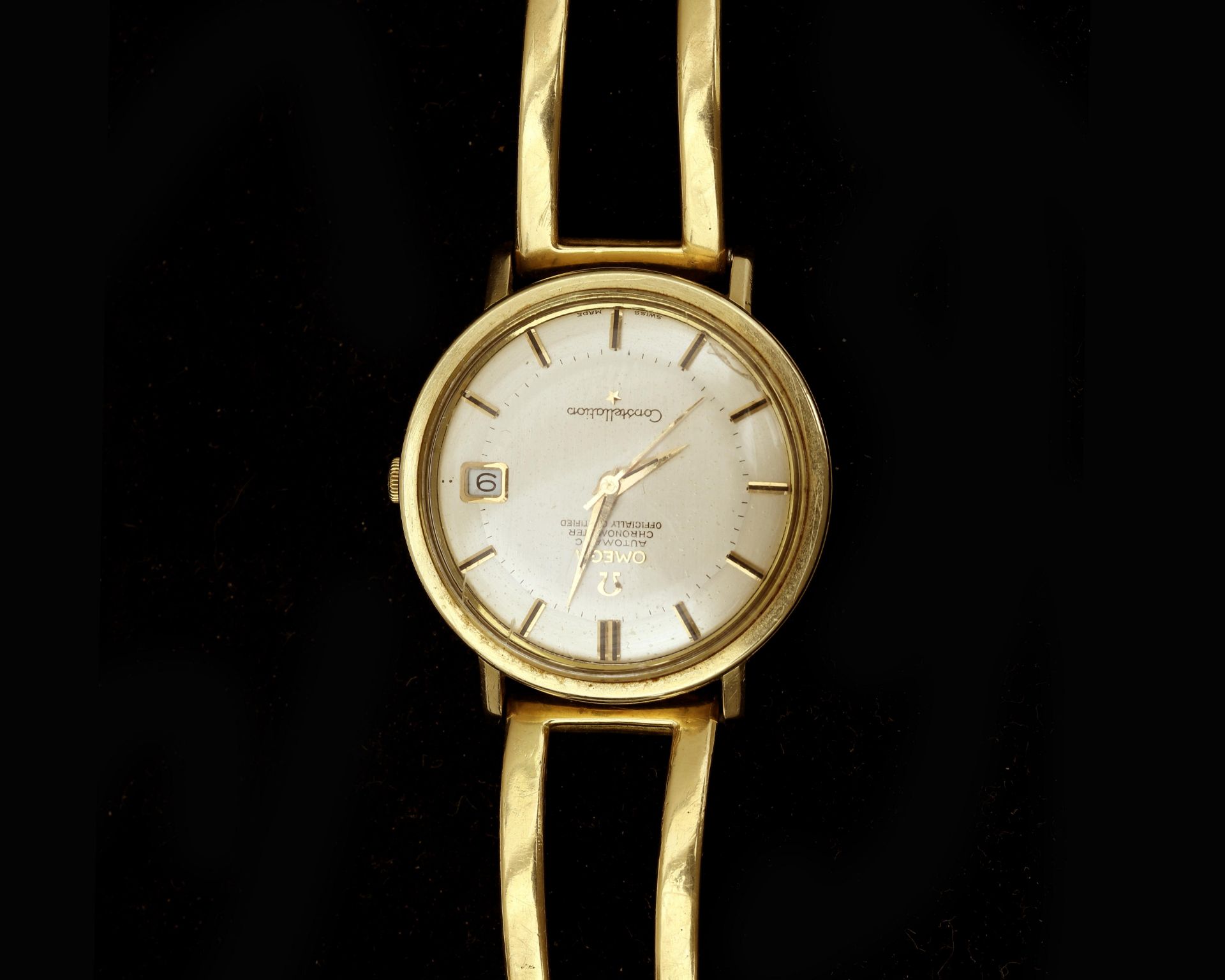 A bi-color Omega Constellation wristwatch with 18 karat gold strap 
