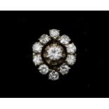 An 18 karat white entourage ring set with brilliant cut diamonds 1.12ct.