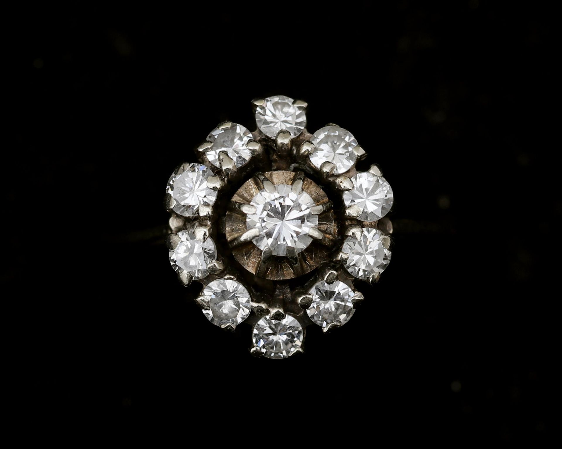 An 18 karat white entourage ring set with brilliant cut diamonds 1.12ct. 
