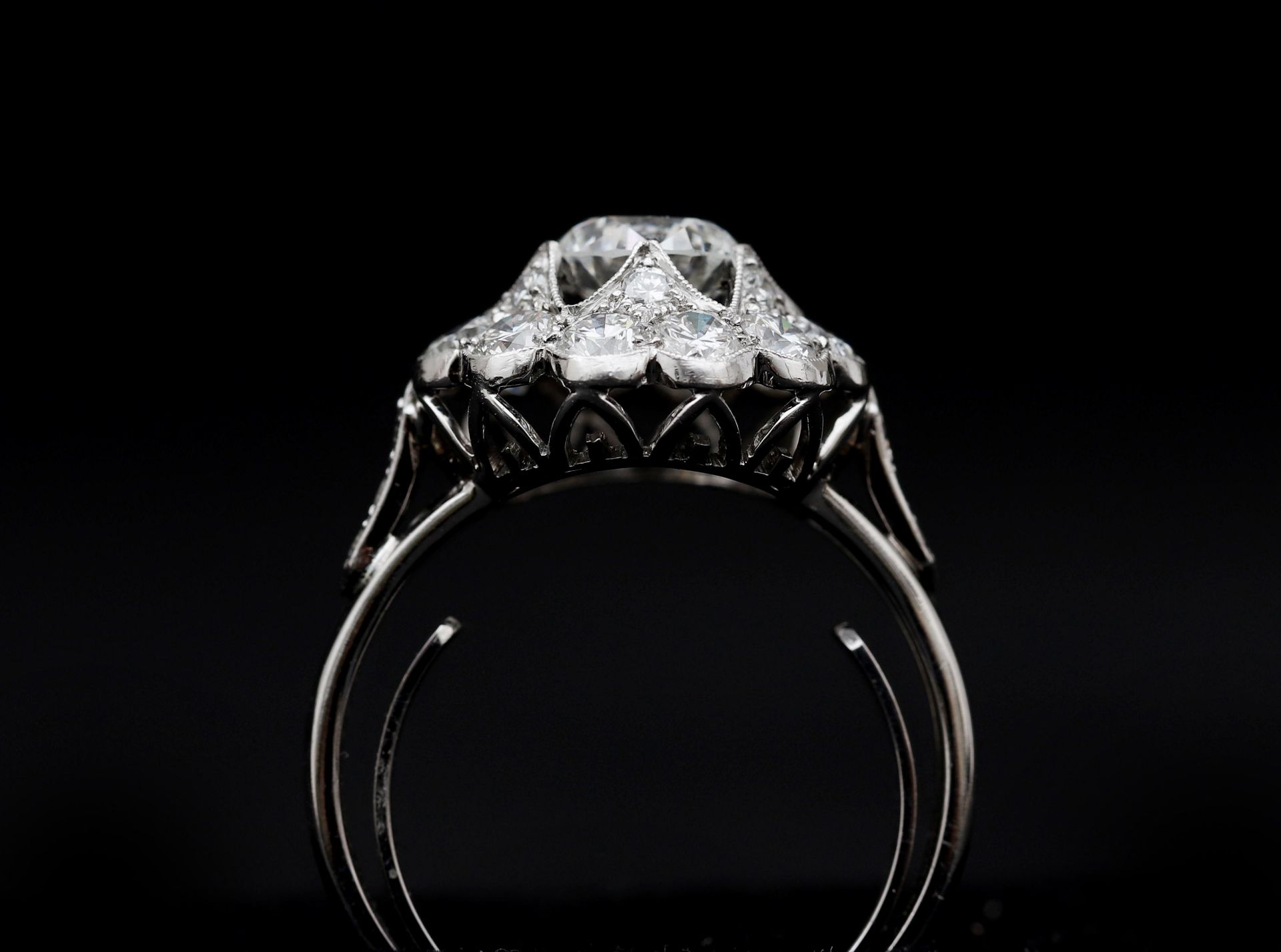 A 14 karat white gold with platinum rosette ring, set with diamonds, in total approx. 2.21ct. - Image 5 of 10