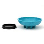 A.D. Copier (1901-1991) A blue moulded Graniver glass cactus bowl on separate black stand,