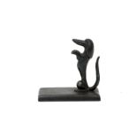 Johannes Bosma (1879-1960) A patinated bronze paperweight shaped as a seated dachshund, circa