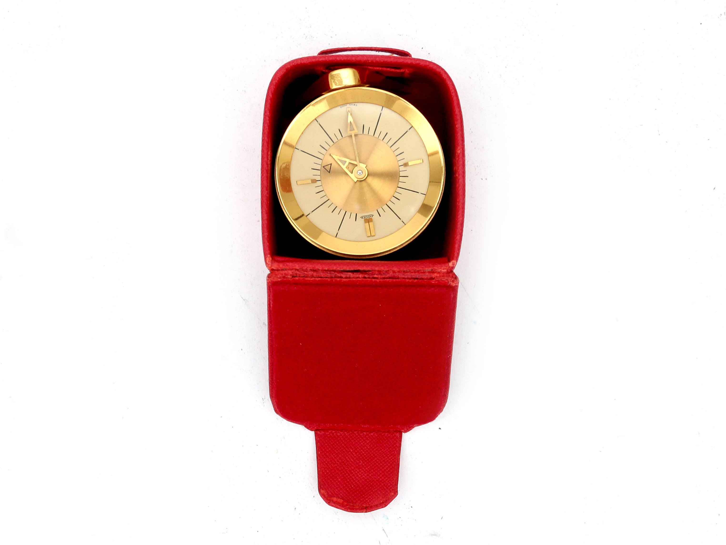 Jaeger A gilt brass travel alarm clock in red box, midcentury, marked to the dial. 5 cm. h. - Image 3 of 5