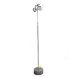 Eighties A grey lacquered metal floorlamp with two spotlights, on cylindrical concrete base. circa