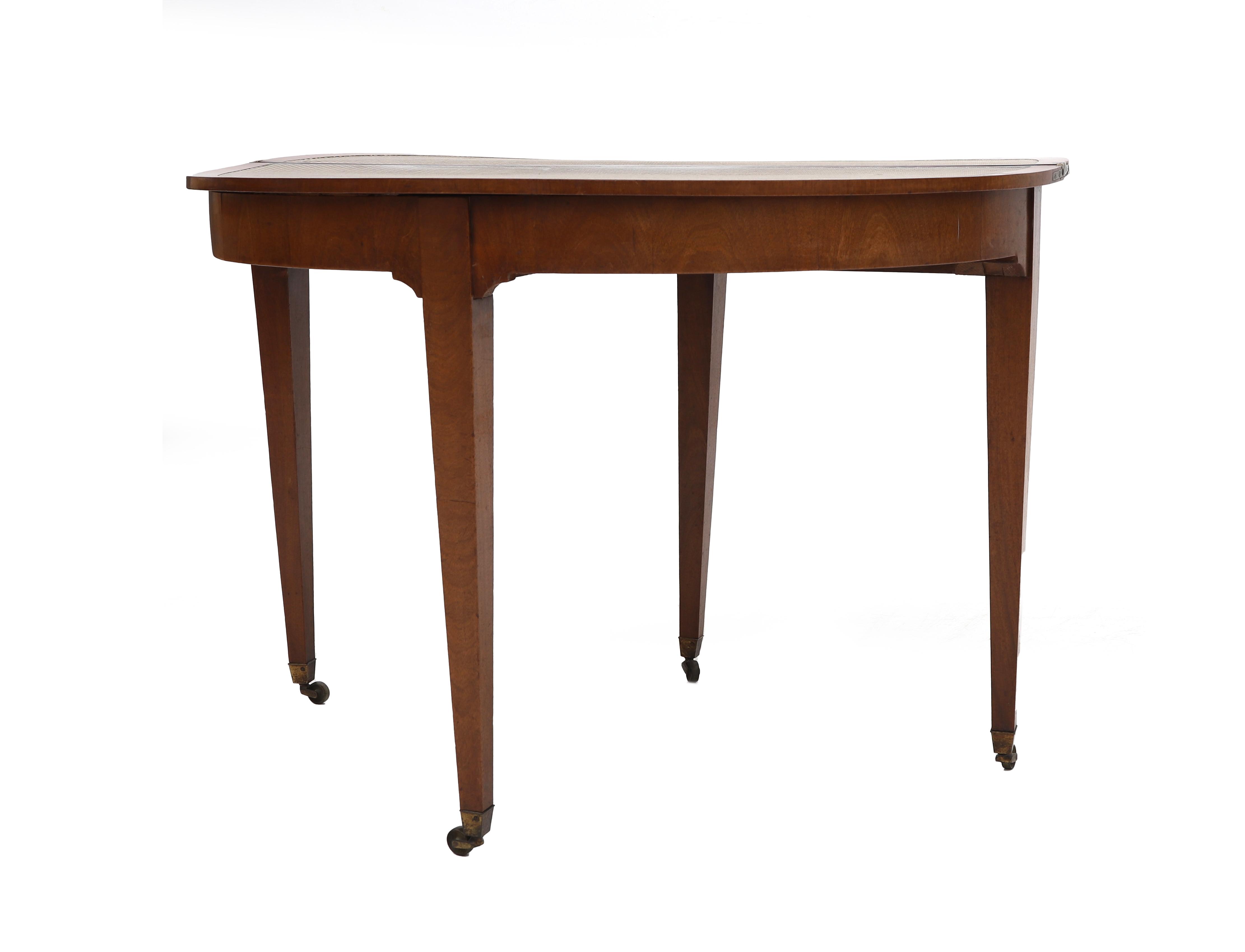 A mahogany demi-lune (crescent) table, Dutch, ca. 1800. The top in two halfs, extendable, resting - Image 3 of 6