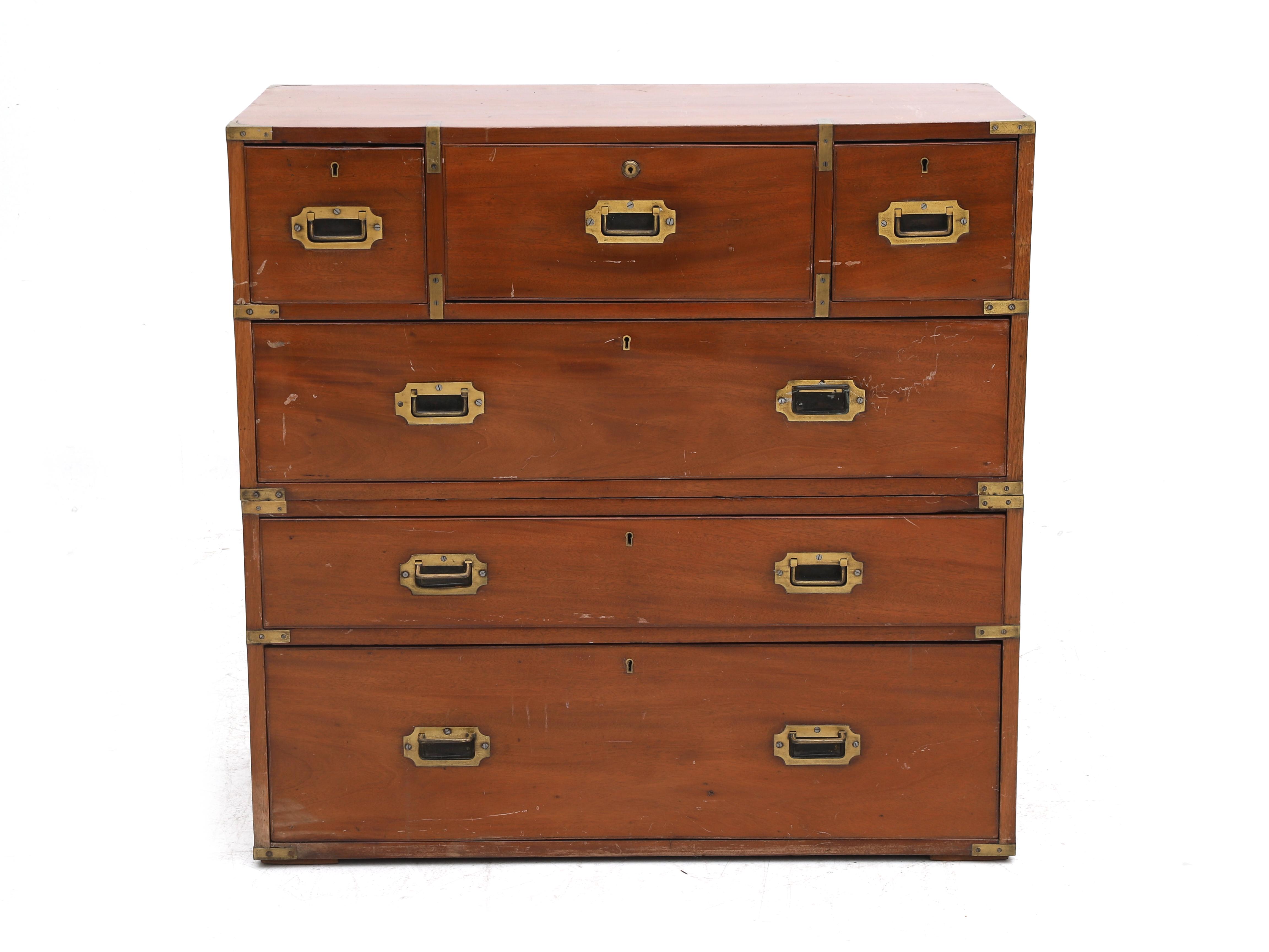 A Mahogany Campaign Desk signed on the lock of the middle drawer of the top row, Bramah London. The