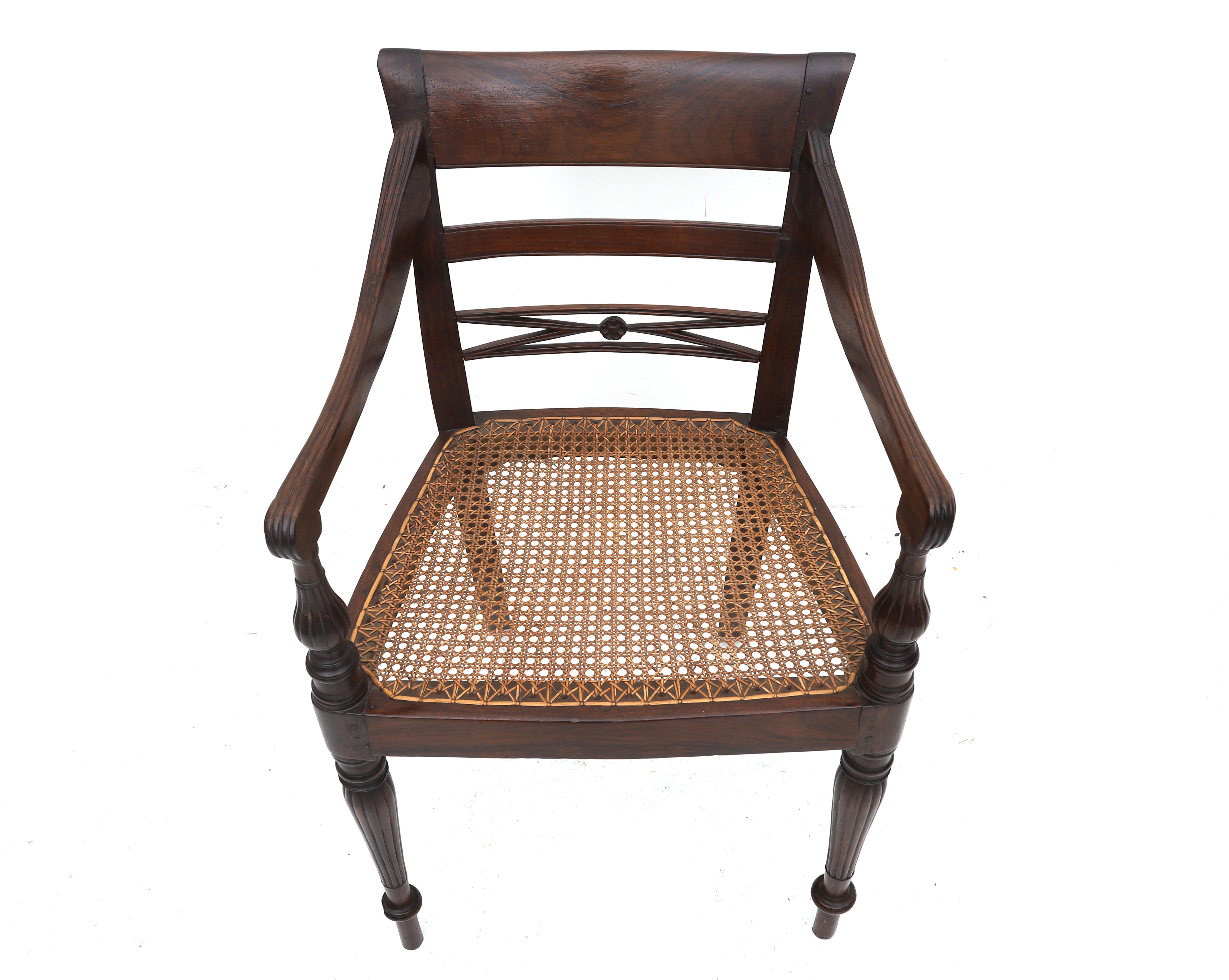 The open back with carved ornaments, webbing seat, armrests with carved details, four tapering - Image 3 of 3